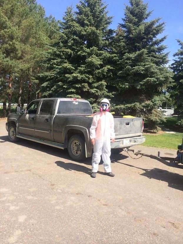 Suited up for spraying